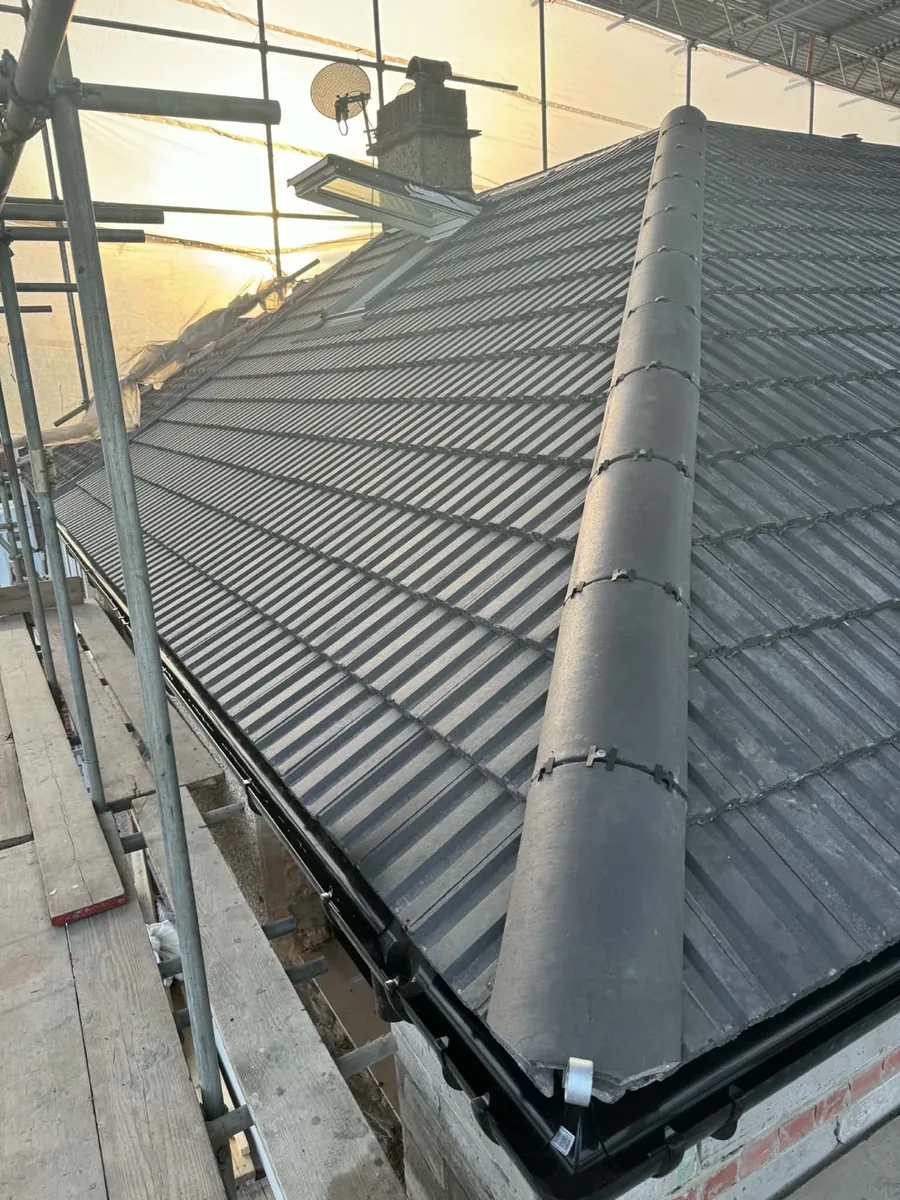 Completed tiled roof with roof windows